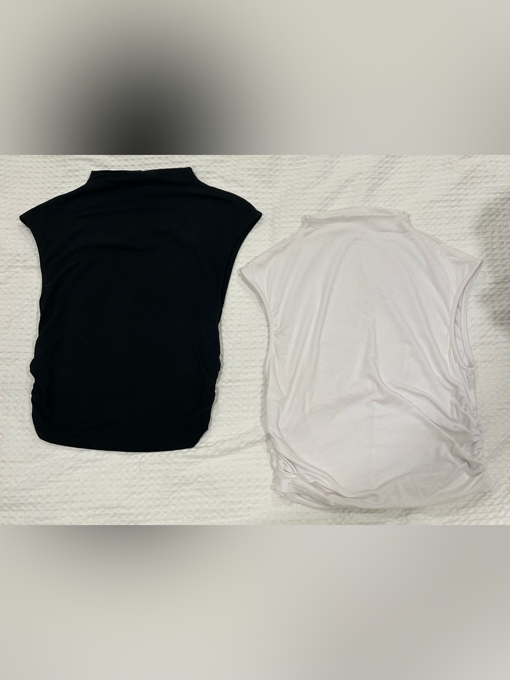 Two high neck tanks